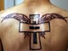 Cross with wings located on back